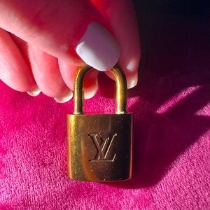 301 Louis Vuitton LOCK. Authentic. No key. CAN ADD CHAIN if interested